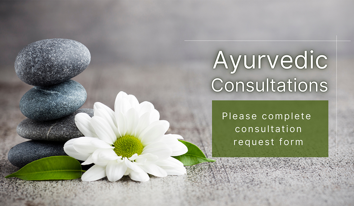 soft rocks and white flowers and words ayurvedic consultations at southport